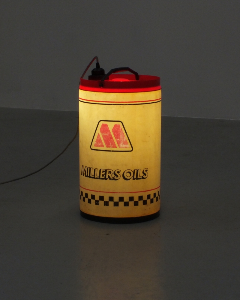 the illuminated lamp made from an repurposed plastic oil container